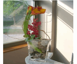 ORCHIDS ORANGE CALLA LILLIES